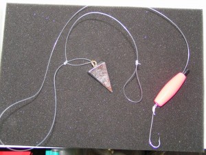 Pyramid weight attached to the loop on a Striped Bass rig Pyramid weight attached to the loop on a Striped Bass rig
