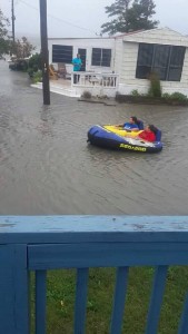 fun in the flood, longneck, delaware , sussex county, kids playing in flood waters