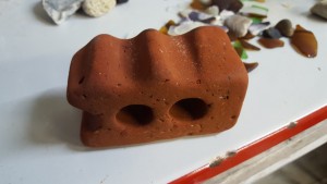 Found this cool brick today. We are going to call it a Spanish galleon terracotta Lego and it is now up for sale for $10,000
